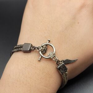 Silver-Tone Toggle Bracelet with Wing Charm